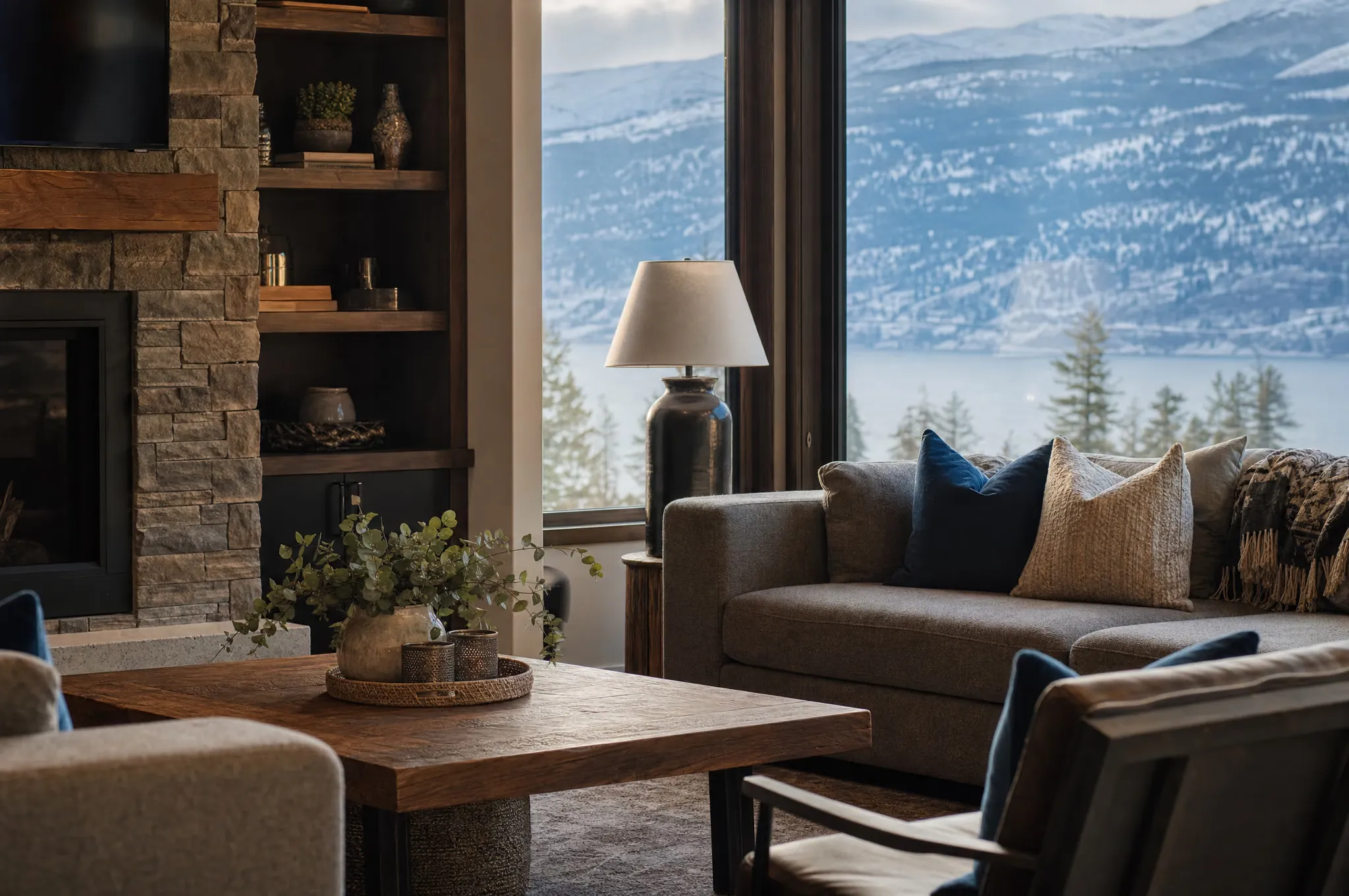 A warm, comfortable Okanagan living room with a mountain view